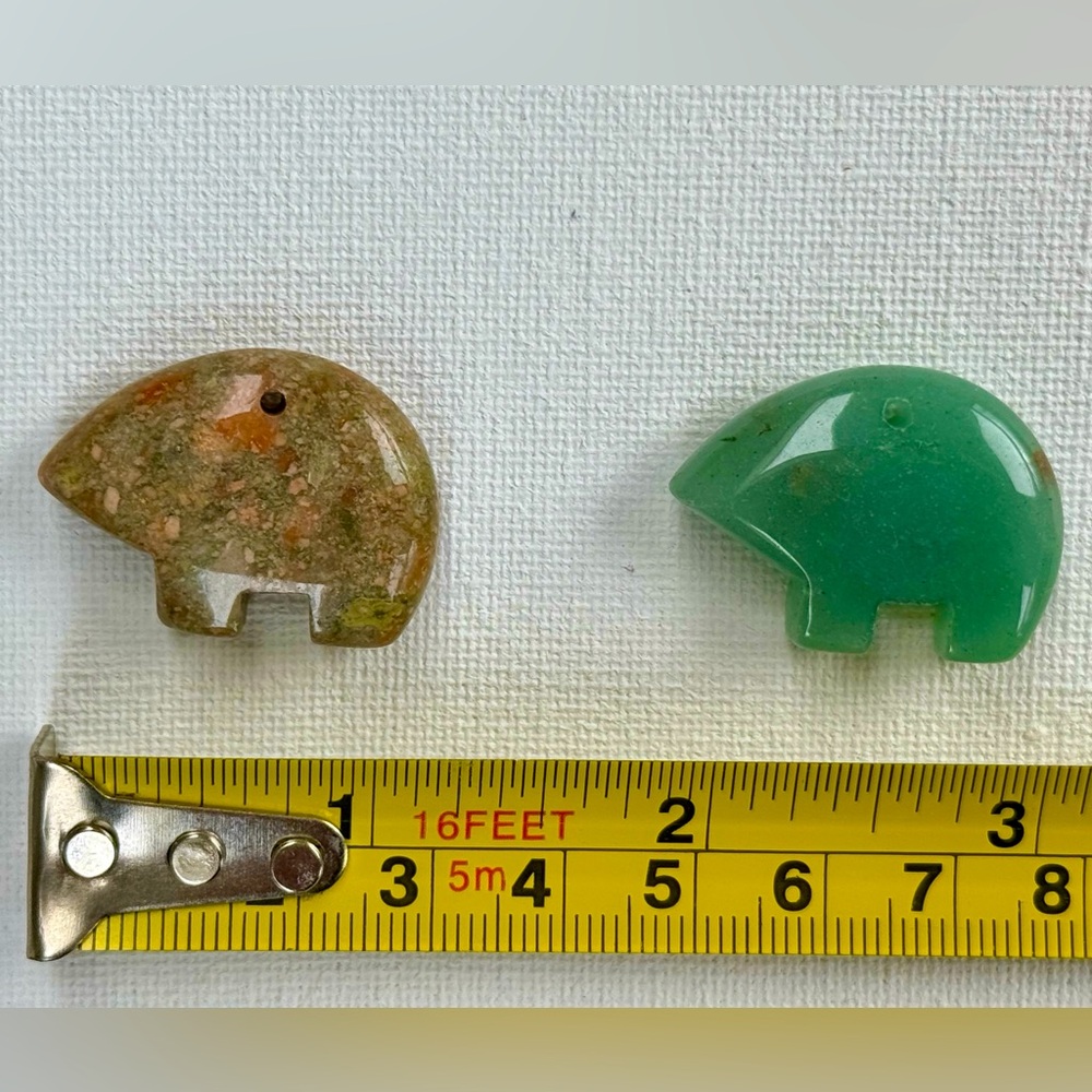 Zuni style stone bear pendants, lot of two.